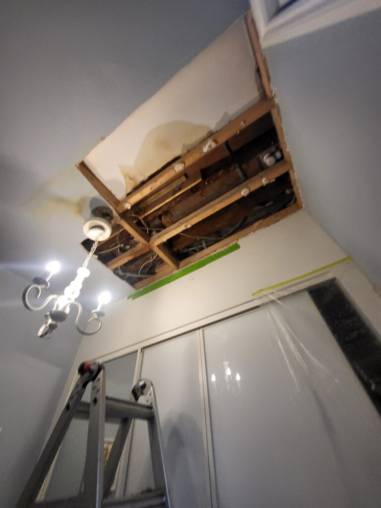 "After addressing the damage caused by a ceiling leak, we didn’t just stop at making repairs. We ensured the ceiling was restored to a smooth and flawless condition, blending seamlessly with the rest of the room. To enhance the space further, we relocated the light fixture to the center of the room, creating a more balanced and visually appealing layout. Our approach not only repaired the damage but also improved the overall look and feel of the room, leaving it refreshed and more inviting."